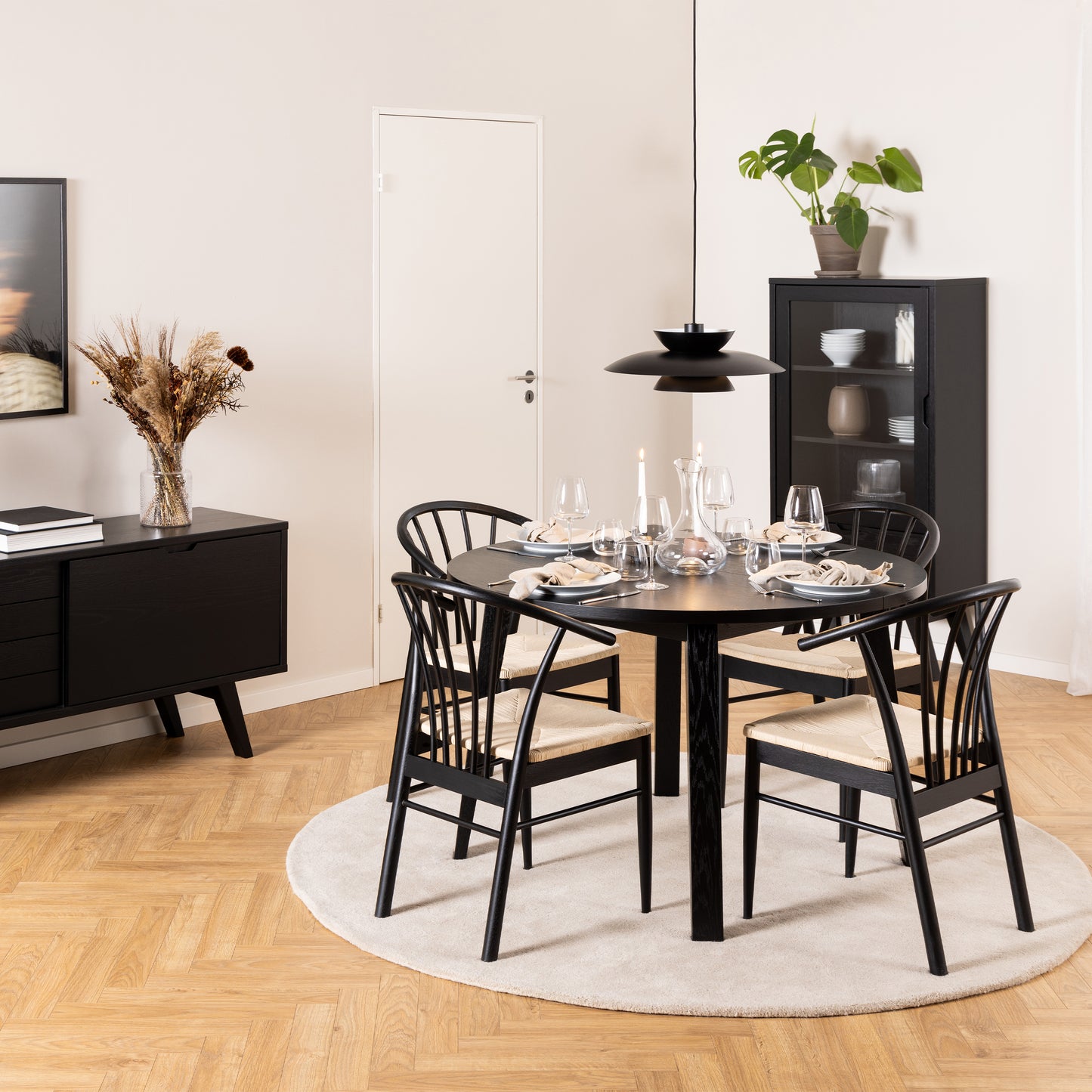 Montreux Round Extending Dining Table in Black 115-154 cm Includes 4 Cassandra Dinning chair includes Armrest in Black